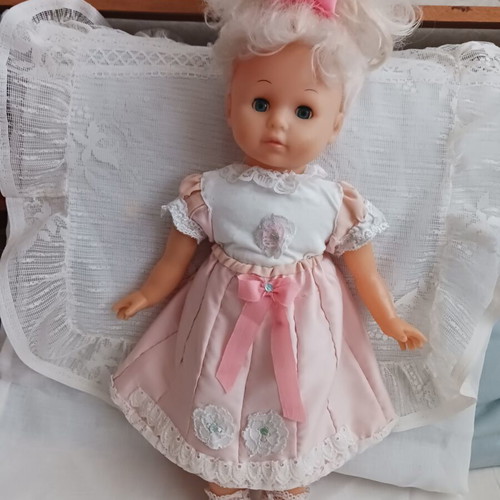 Vintage doll with handmade clothes like new