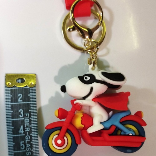 Snoopy figure on motorcycle new, collectible