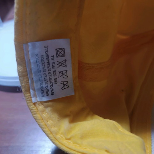 Hat yellow, like new, one size