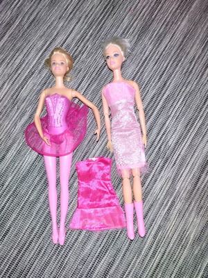 Barbie dancer used with gift doll and two dresses