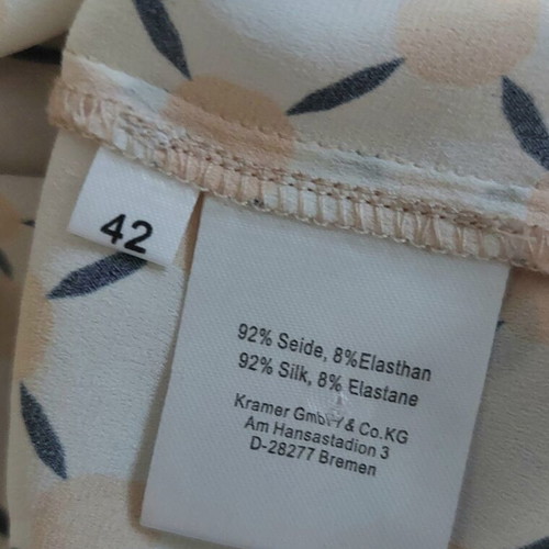 Silk women's shirt like new with geometric and leaf pattern