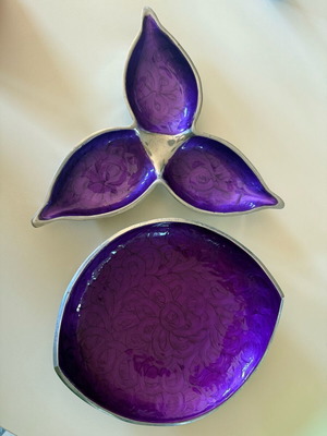 Set of decorative metal bowls with purple interior like new