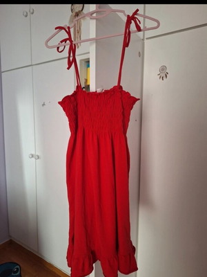 Red dress with smocked top and adjustable straps, size M
