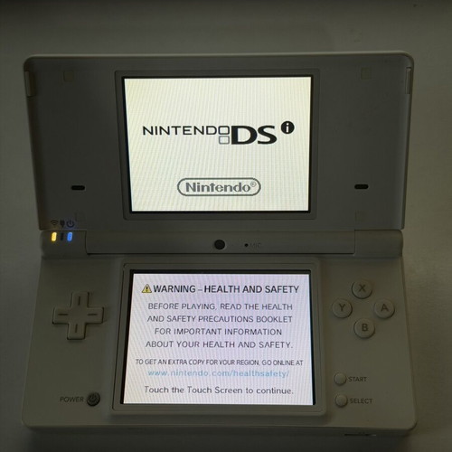 Nintendo DSi used with 1 game and 1 charger