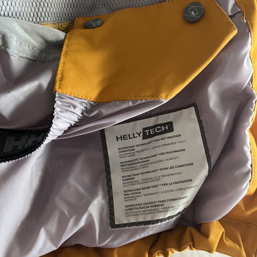 Helly Hansen jacket used, waterproof, warm, size L, yellow and orange