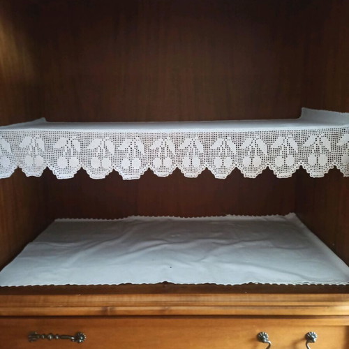 Knitted lace on fabric for buffet shelf like new
