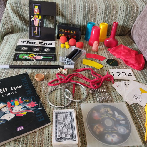 Magic trick game used with 120 tricks and DVD instructions