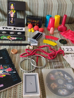 Magic trick game used with 120 tricks and DVD instructions