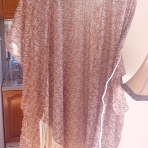 Kimono with soft color and fringes