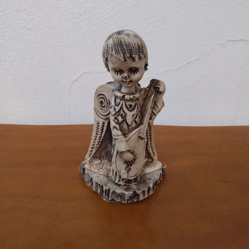 Vintage decorative goth style angel figurine used
