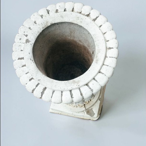 Cement garden urn Roman style used with patina decorative