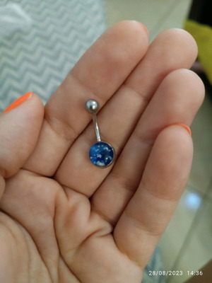 Navel piercing used, made of steel