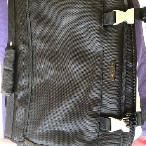 Bag black new with 4 inner pockets for travel and office use