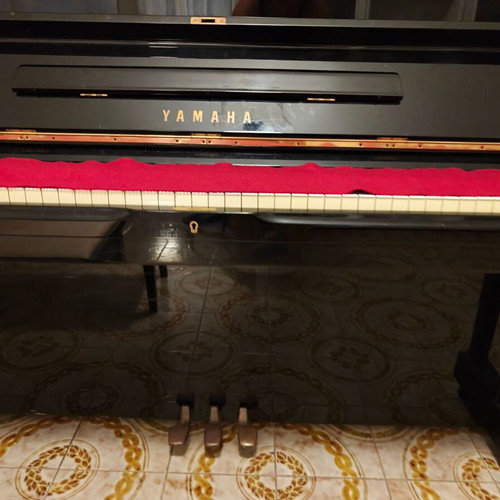 Yamaha piano black slightly used