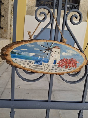 Handmade wooden wall decor with Cycladic art style