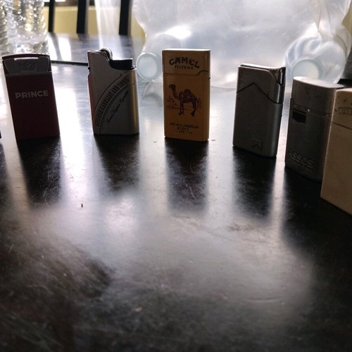 Collection of 7 used vintage metal lighters pack