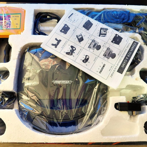 Retro 32-bit game console like new with accessories