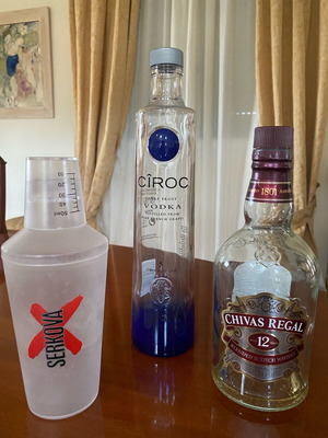 Empty premium liquor bottles and cocktail shaker like new