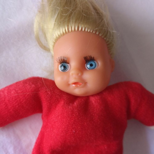 Red vintage doll used, small