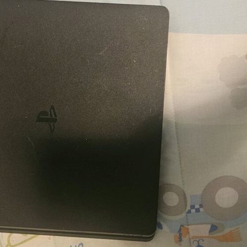 Ps4 used with 6 games and 2 headphones