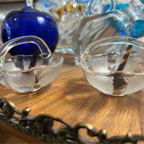 Two small glass baskets with spoon for caviar used