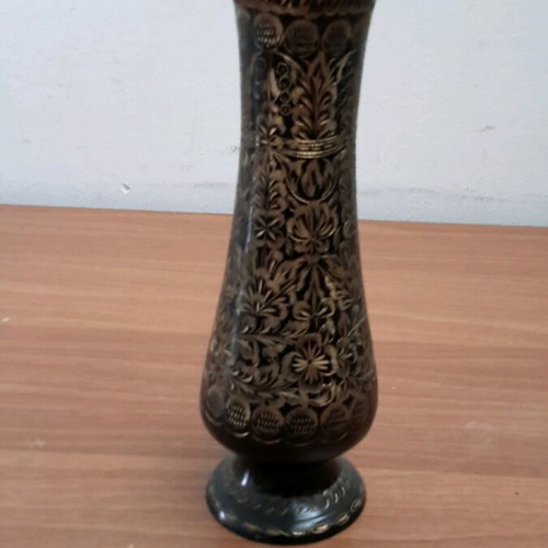 Metal vase with beautiful engraved designs