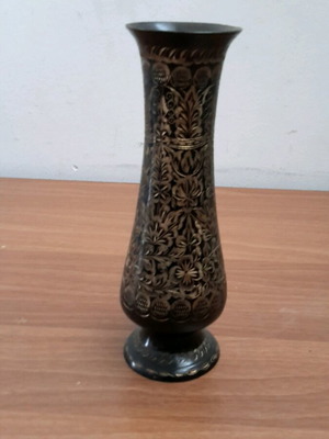 Metal vase with beautiful engraved designs