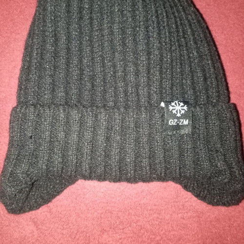 Black hat with ear coverage and fur lining new