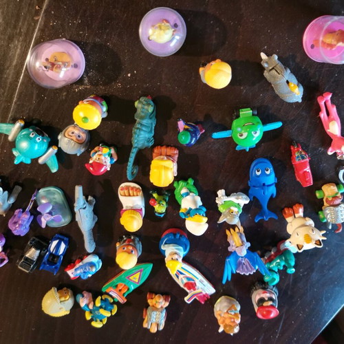 Vintage collection of 41+ used Kinder Surprise toys