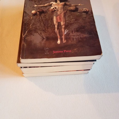 Pack of 4 books The Legend of Manitou like new