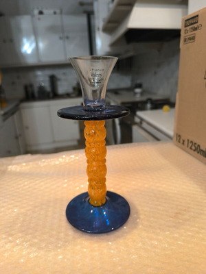 Glass candlestick like new in blue and yellow shades GIF1020