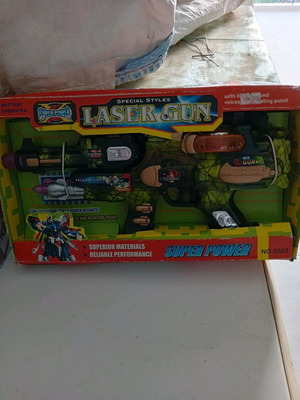 Super power laser gun new with lights, sounds and rotating point
