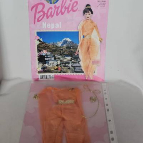 Discover the world with Barbie magazine collection with doll clothes