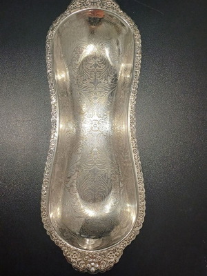 Large metal bowl used with carved design