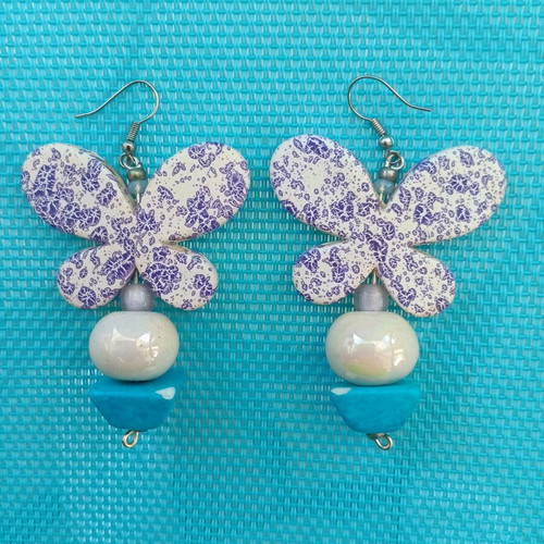 Butterfly clay earrings used with slight damage
