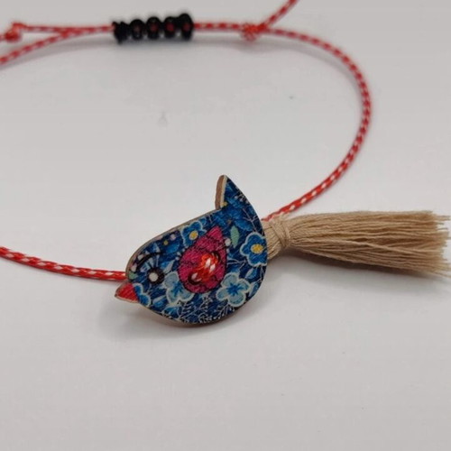Martis bracelet with wooden blue bird and tassel new