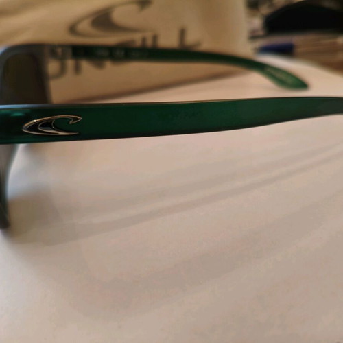 O'NEILL sunglasses like new with grey and green mirror lenses