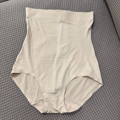 High-waisted nude seamless shapewear slip, size M