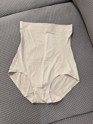 High-waisted nude seamless shapewear slip, size M