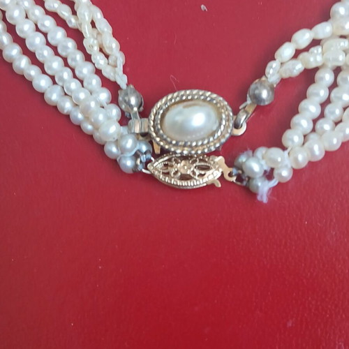 Two freshwater pearl necklaces with gold and metal clasps