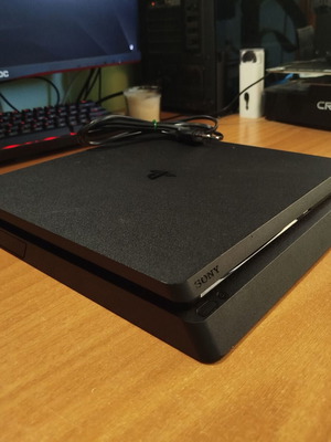 PlayStation 4 Slim 1TB like new with power cable