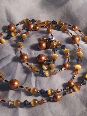 Swarovski crystal long necklace new, beige and yellow
