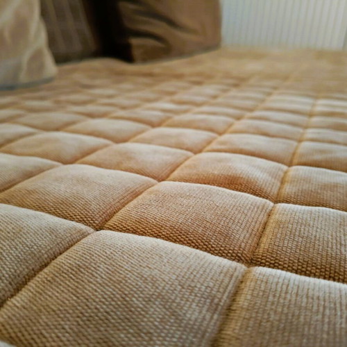IKEA Beddinge/Nyhamn three-seat sofa bed, brown quilted cover