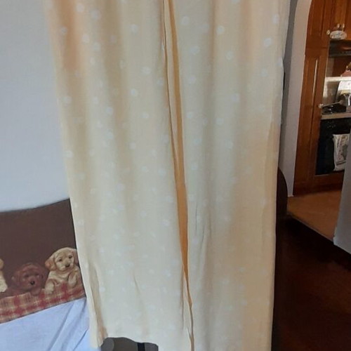 Women's palazzo pants like new, pale yellow with white polka dots