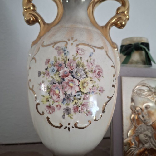 Vintage porcelain vase with floral design and gold handles