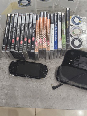 Sony PSP 3000 Piano Black console used with charger, case and 22 UMD games
