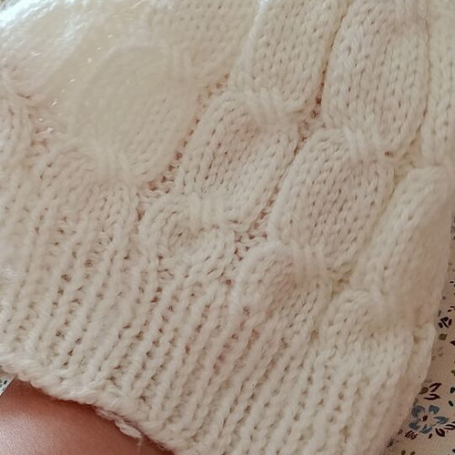 Children's knitted hat with pom pom, like new, white