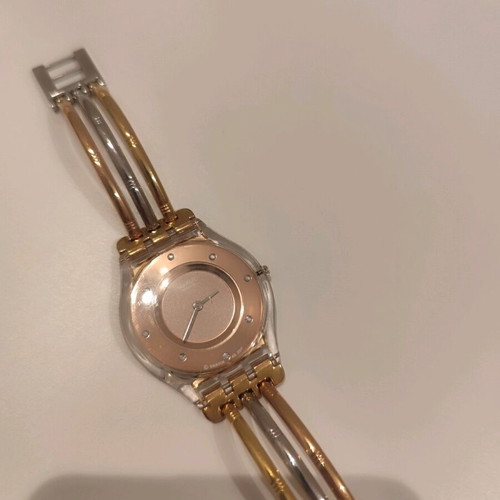 Swatch watch like new, gold and silver