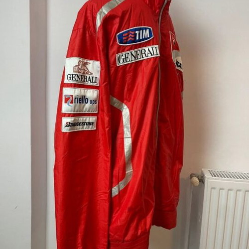Ducati team jacket used, moderate condition with holes and stains