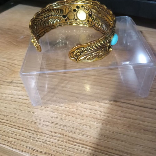 Ethnic bracelet like new, gold color with stones